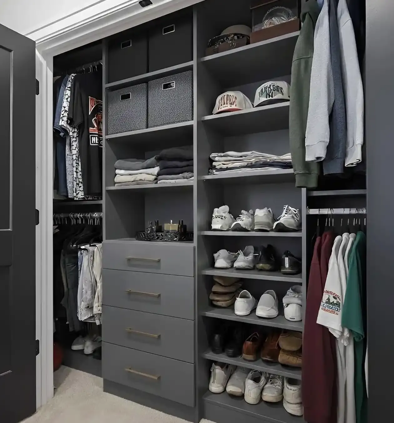 Custom reach-in closet with double hanging rails, folded shelving and a drawer bank, built by Closet Form in Toronto